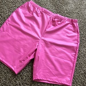Pink leather biker shorts